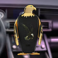 Eagle style car phone holder with wireless charging base and snap-on suction cup mount in black and gold colour.