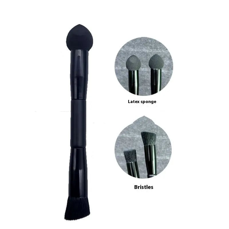 Black foam sponge tip concealer brush with a wooden handle for under-eye makeup application.