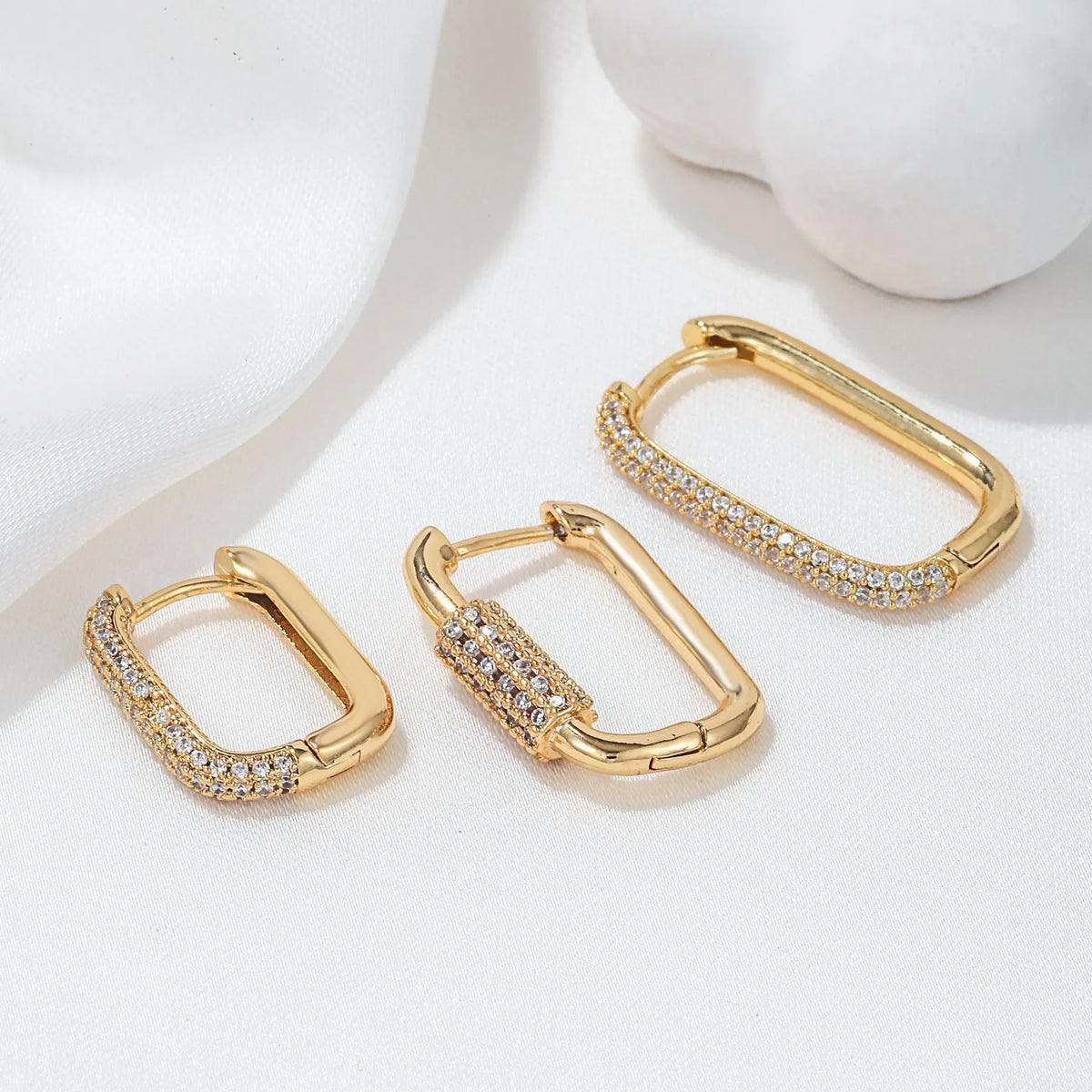 Geometric ear clip set with micro inlaid zircon stones in gold and white finishes
