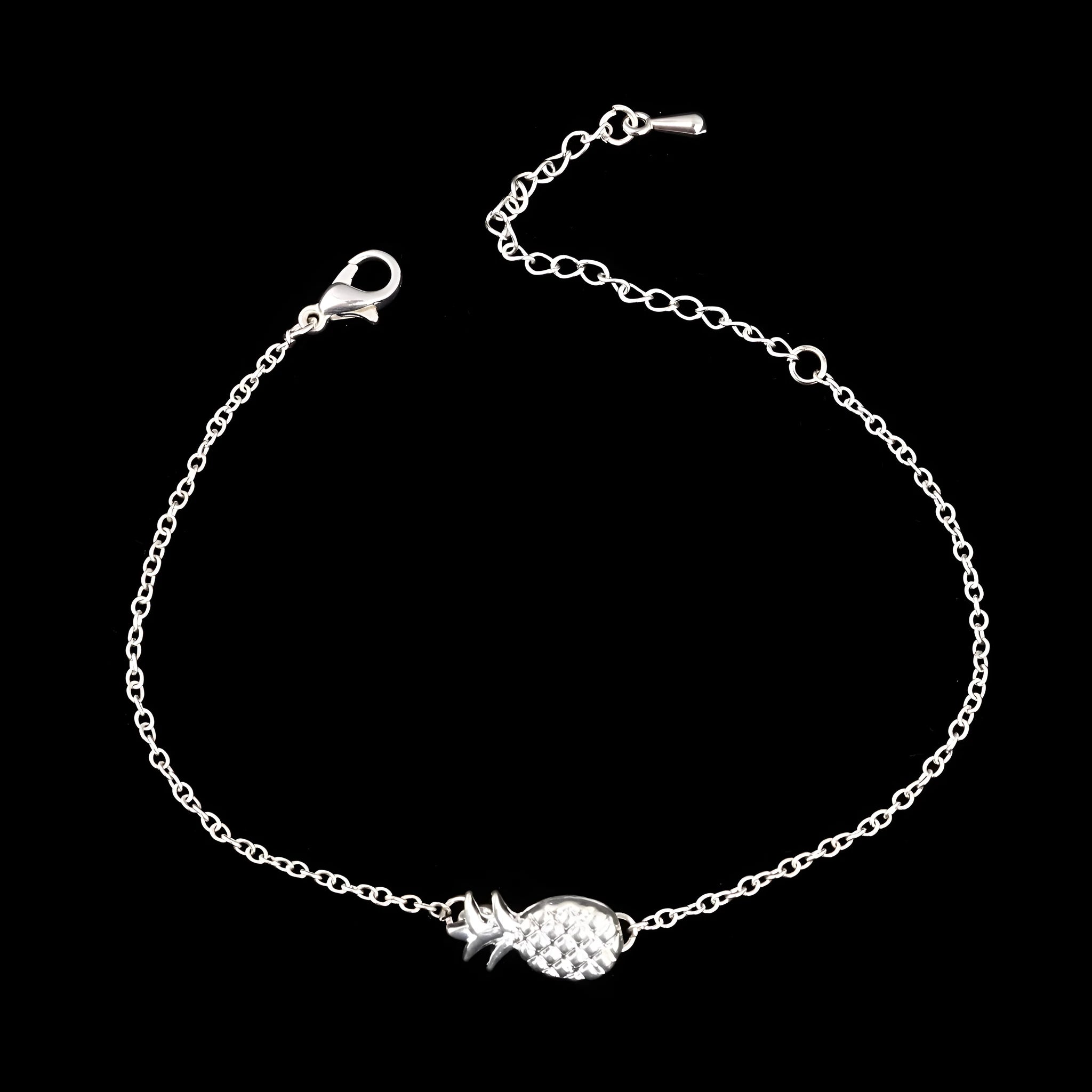 Gold or silver alloy bracelet with a simple pineapple charm pendant.