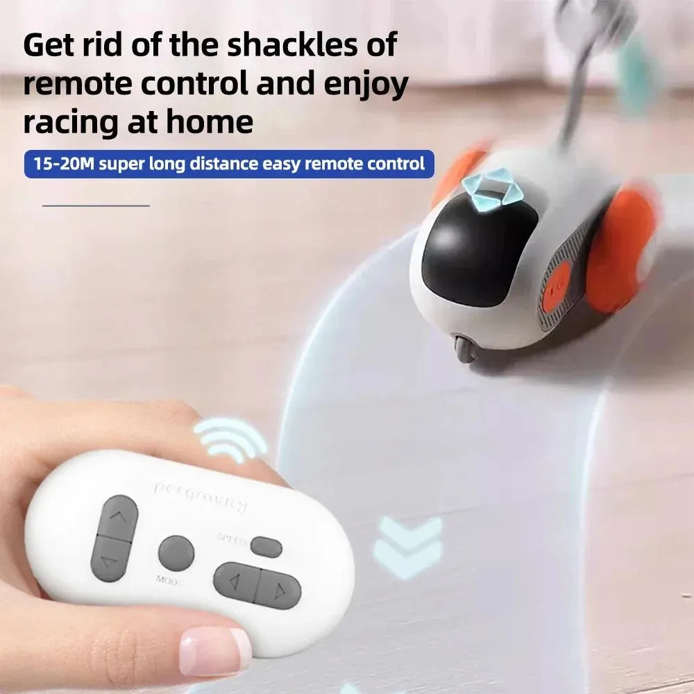 Blue remote-controlled cat toy car with feather attachment on orange background