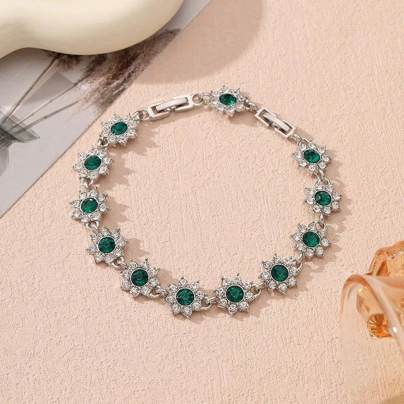 Flower charm bracelet in zinc alloy with electroplated finish and colourful crystal accents
