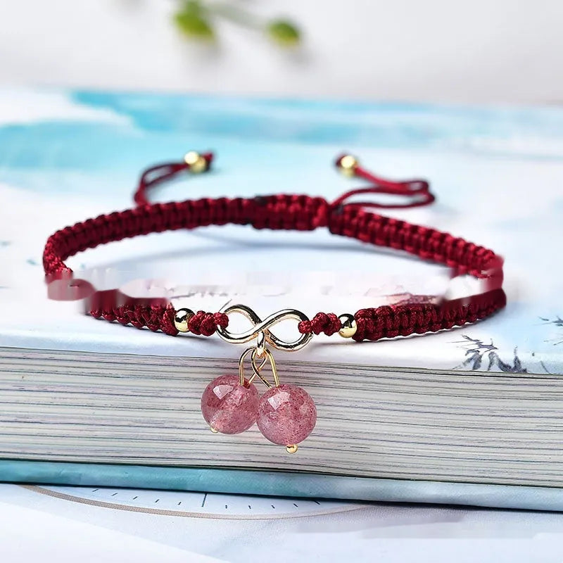 Women's natural crystal bracelet with fruit-shaped beads in strawberry quartz, amethyst, or green phantom quartz.