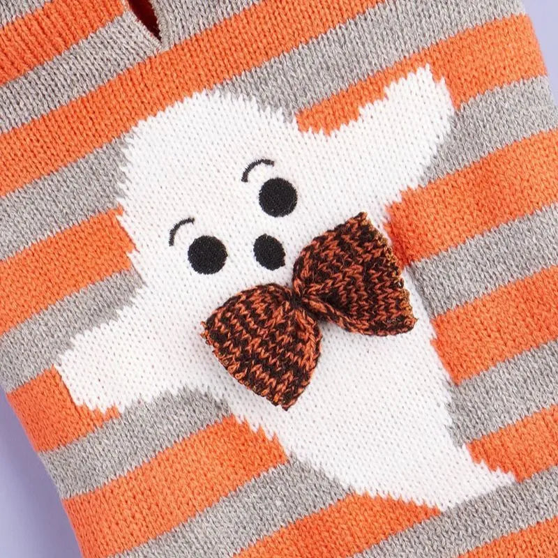 Orange striped Halloween pet sweater with knitted acrylic construction and hooded fur ball detailing
