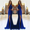 Red long evening dress with a high waist, hollow details, and a flowing large swing skirt.