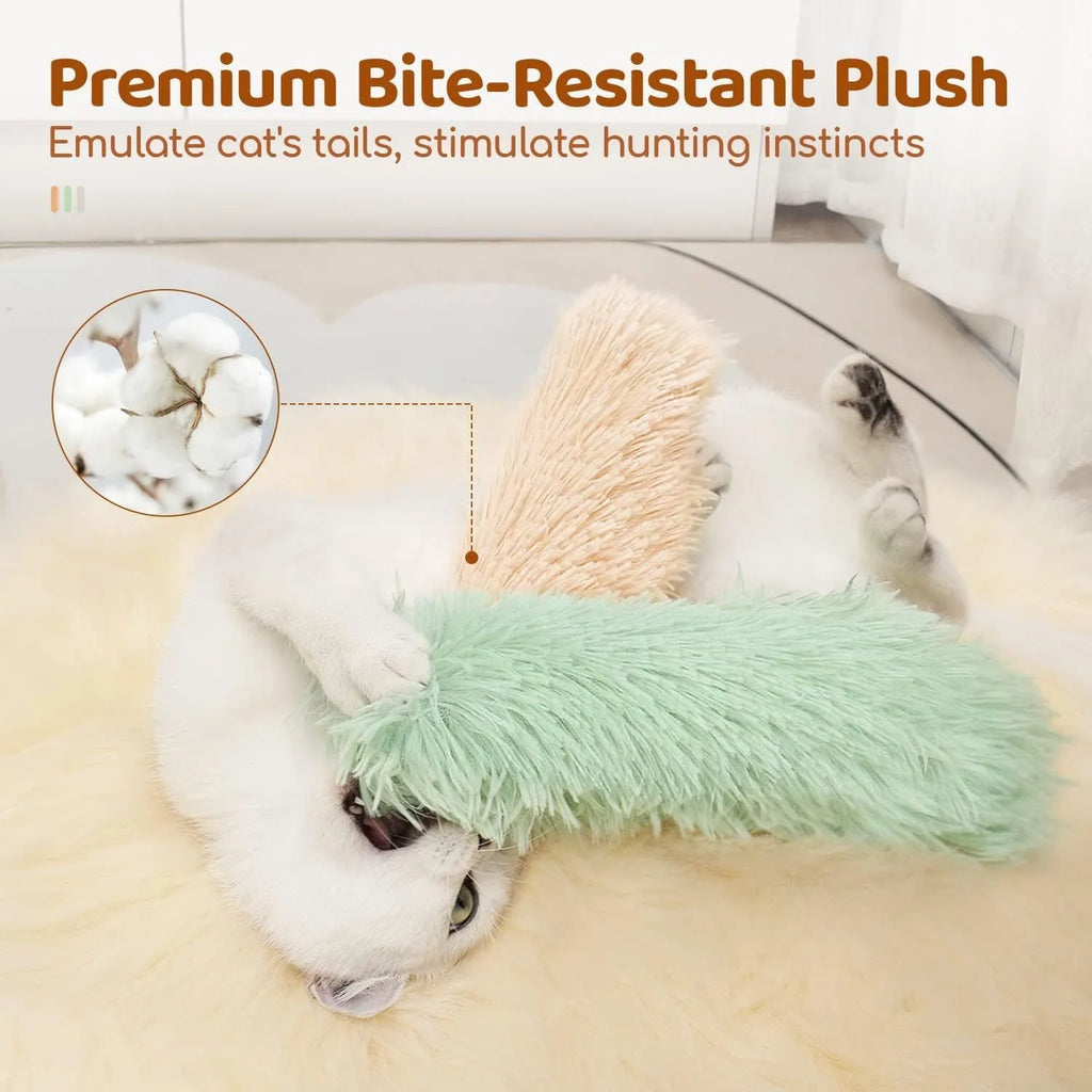 Small green plush pillow cat toy measuring 27cm by 10cm on a plain background