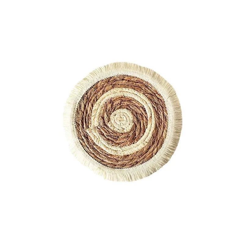 Round papyrus placemat with corn rope tassel edge in solid natural colour, available in multiple sizes.