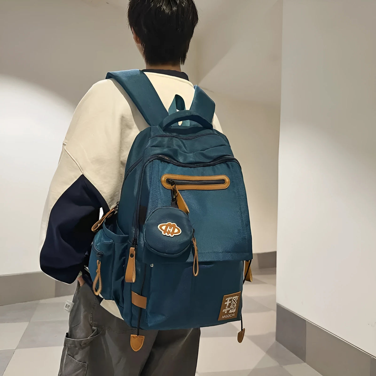 Large nylon school backpack for middle school students in multiple colour options.
