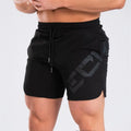 Men's black quick-dry running shorts with elastic waist and knee-length design for summer sports