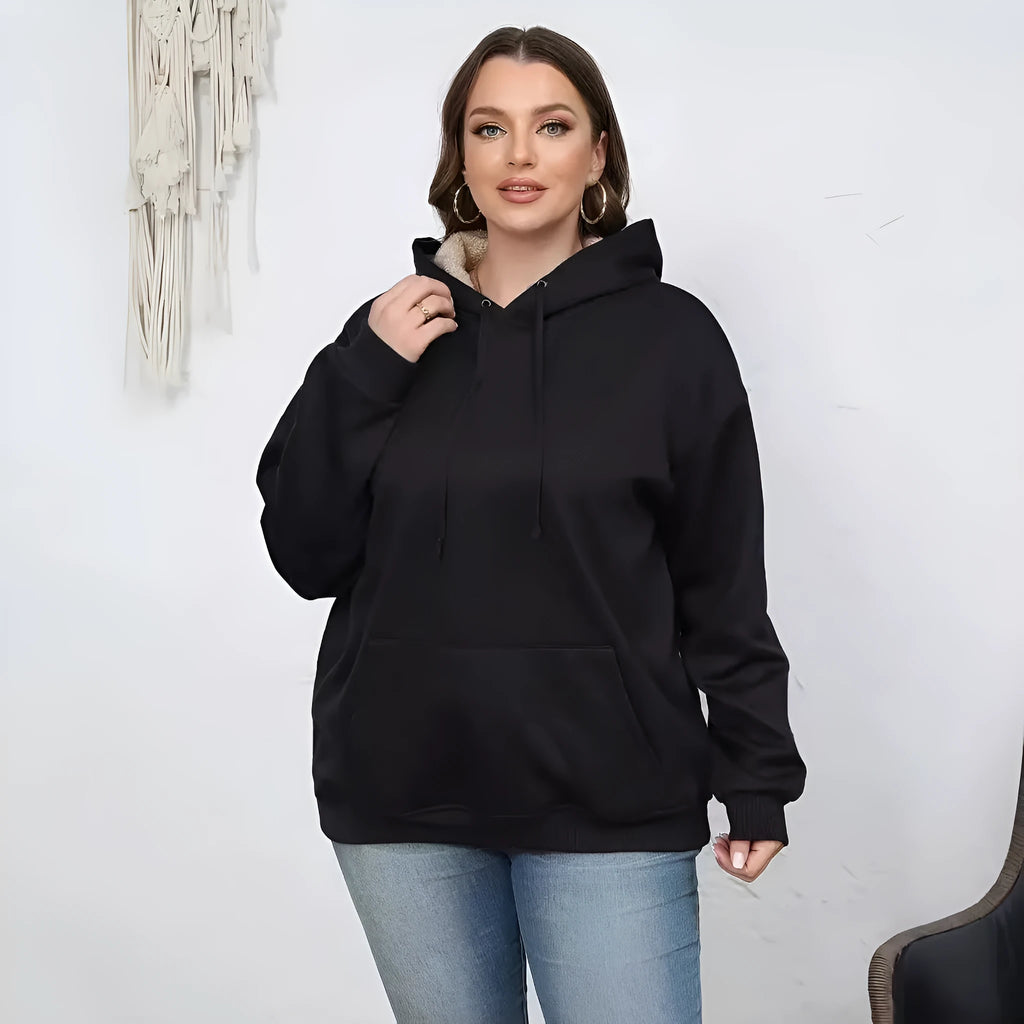 Women's thick polyester hooded sweater with pockets in loose fit