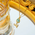 Gold coloured titanium steel necklace with a detailed zircon tulip flower pendant on an O-ring chain.