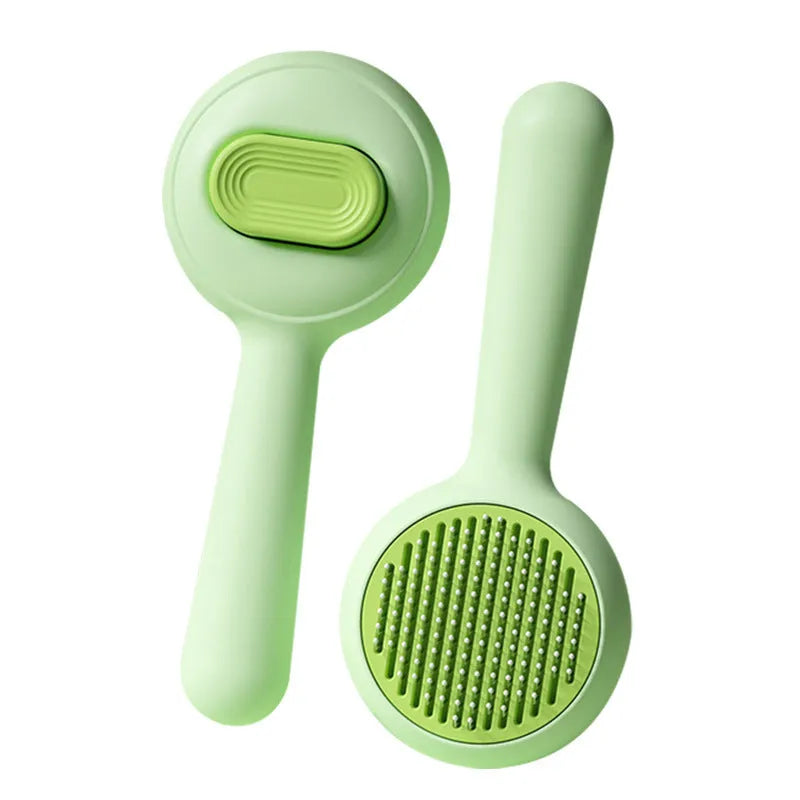 Yellow stainless steel cat grooming brush with non-slip handle for hair removal.