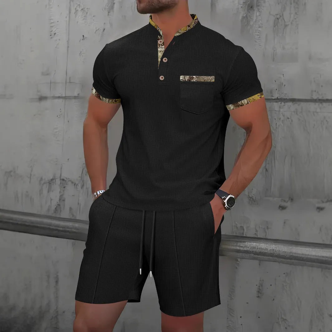 Men's grey cotton blend polo short sleeve suit with matching shorts laid flat