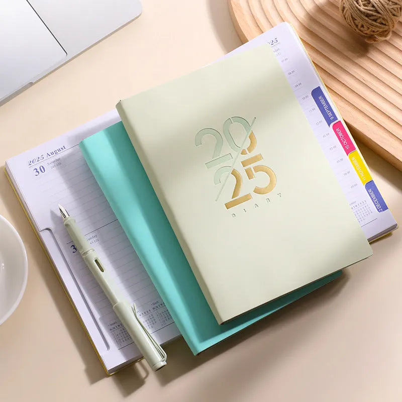 A5 soft faux leather daily planner open on a desk, showing Dorian paper and lay-flat binding.