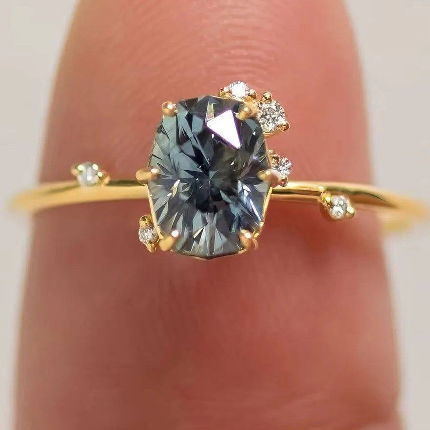 Gold plated women's ring with green zircon flower design on alloy band
