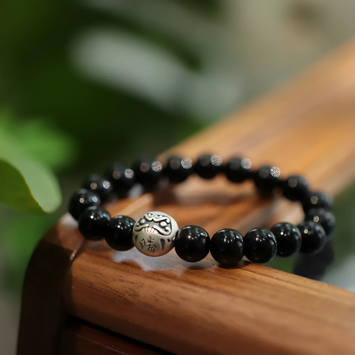 Black agate bracelet with 10mm beads and sterling silver Chinese style design