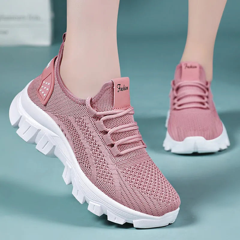 Women's white sneaker with thick PVC sole and breathable flyknit upper