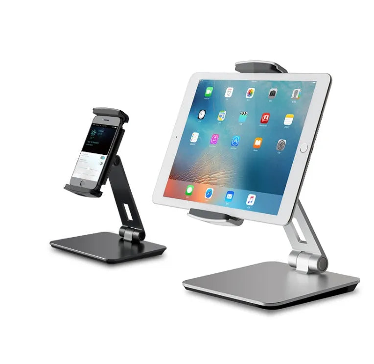 Silver foldable aluminium tablet phone holder showing 360-degree rotation mechanism and silicone anti-slip pads