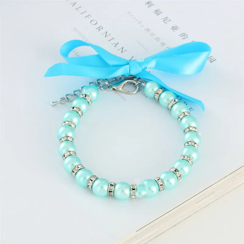 Handmade imitation pearl and rhinestone dog necklace with ribbon bow and adjustable clasp in blue pink purple or white for small pets