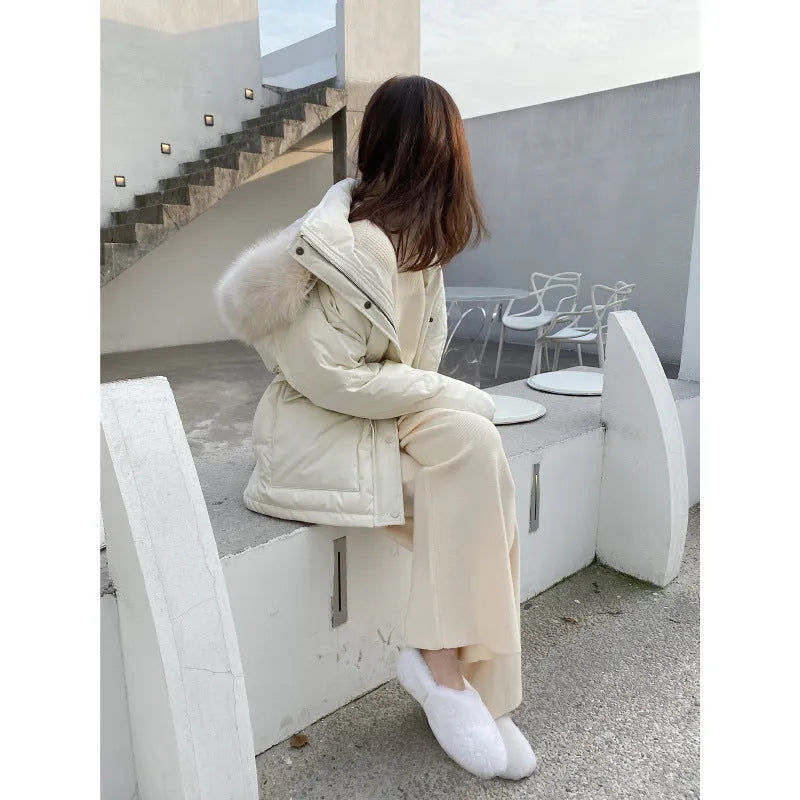 Women's knitted wide-leg trousers in cream white with high waist and straight-leg cut