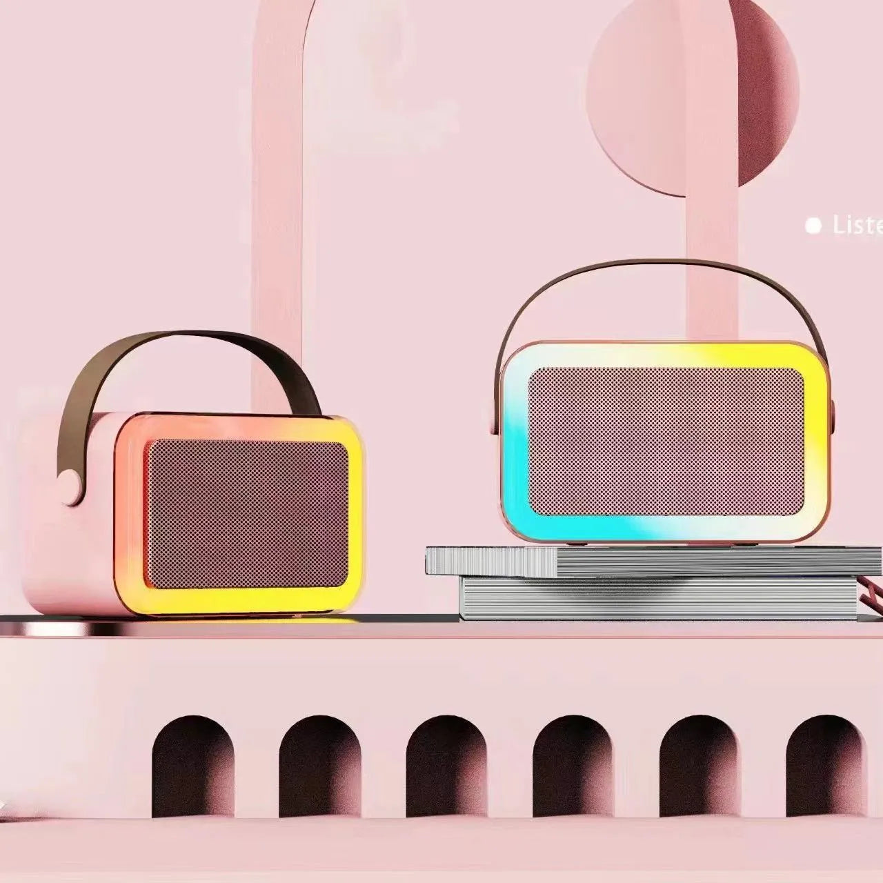 Pink portable Bluetooth karaoke speaker with coloured lights and built-in microphone on a white background.