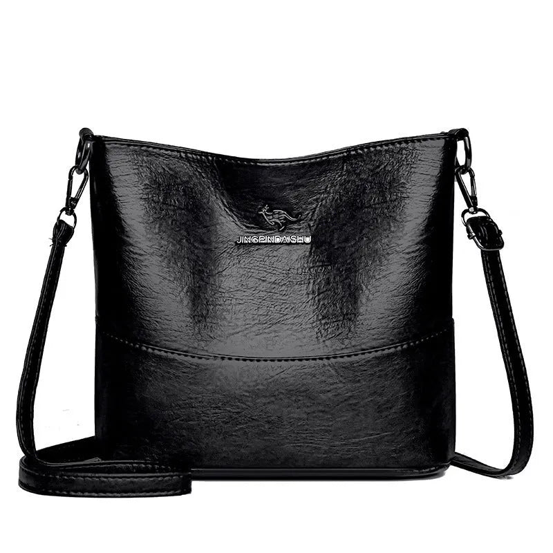 Women's leather bucket shoulder bag in solid colour with phone pocket and sandwich pockets