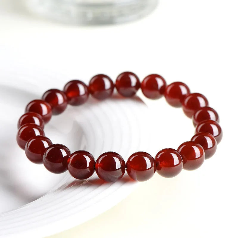 Natural orange red garnet ball bracelet with Ruyi style beads in 5A and 7A grades