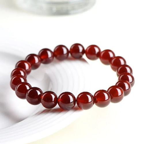 Natural orange red garnet ball bracelet with Ruyi style beads in 5A and 7A grades