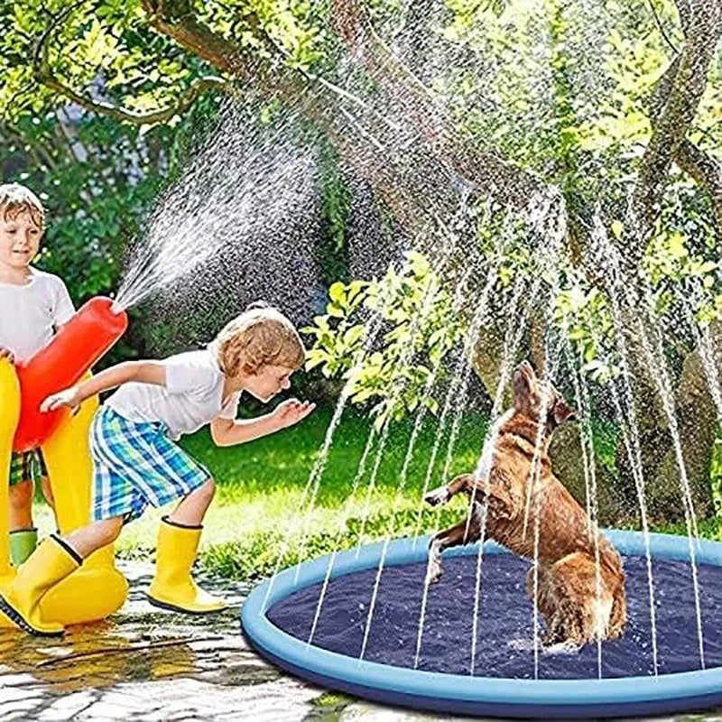 A large, round blue dog splash pad with a textured surface, filled with shallow water, sitting on a green lawn.