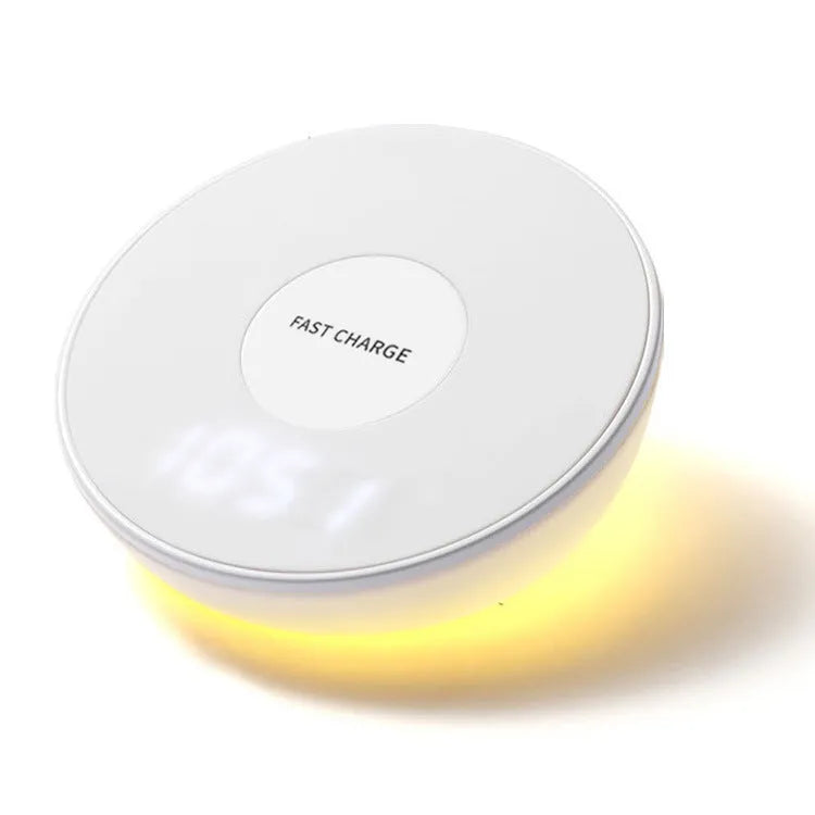 White wireless charging pad with digital clock display and control buttons