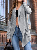 Grey loose-fit women's cardigan sweater coat with pockets, shown on a hanger.