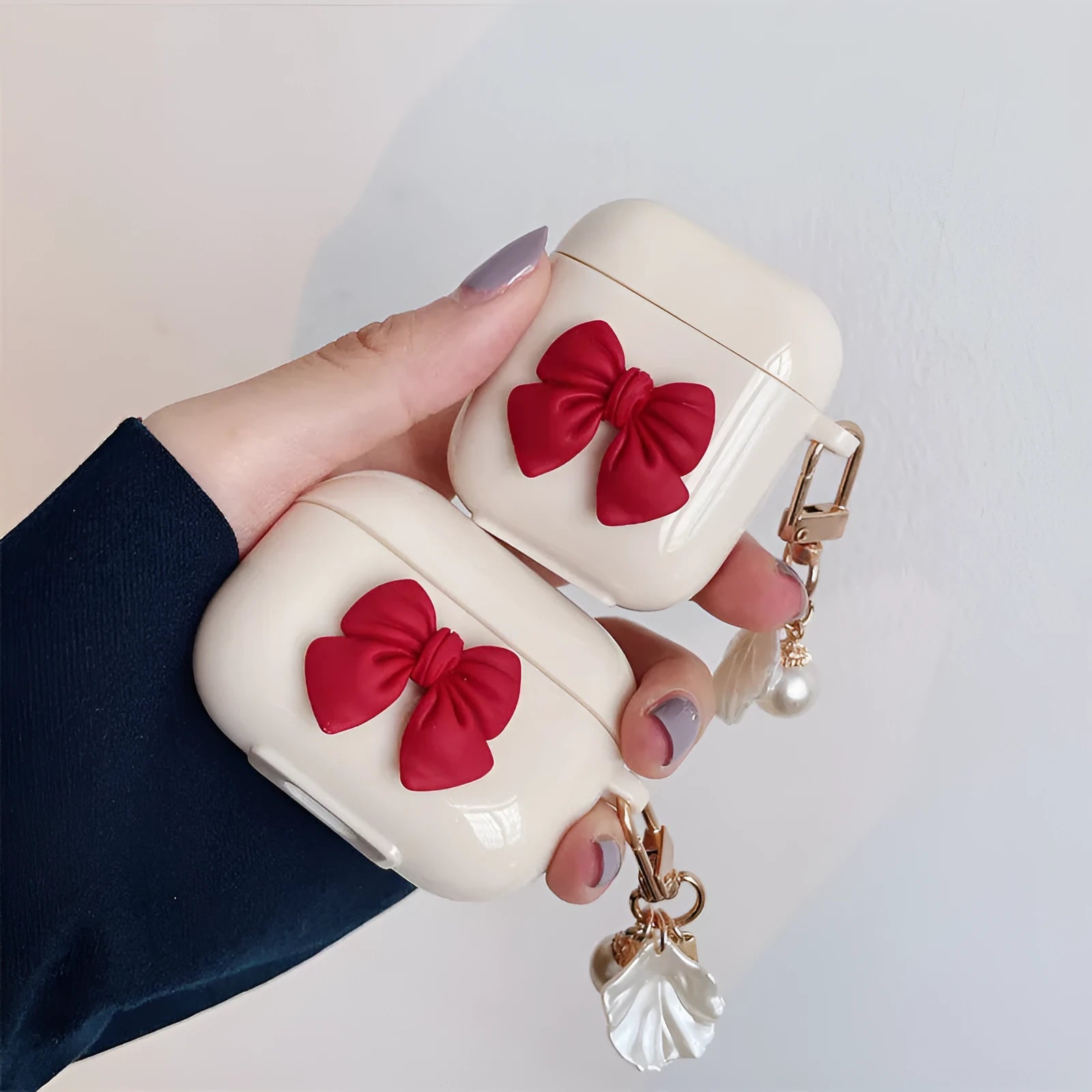 Beige red bow shell TPU protective case with clamshell closure for AirPods Pro wireless earphones