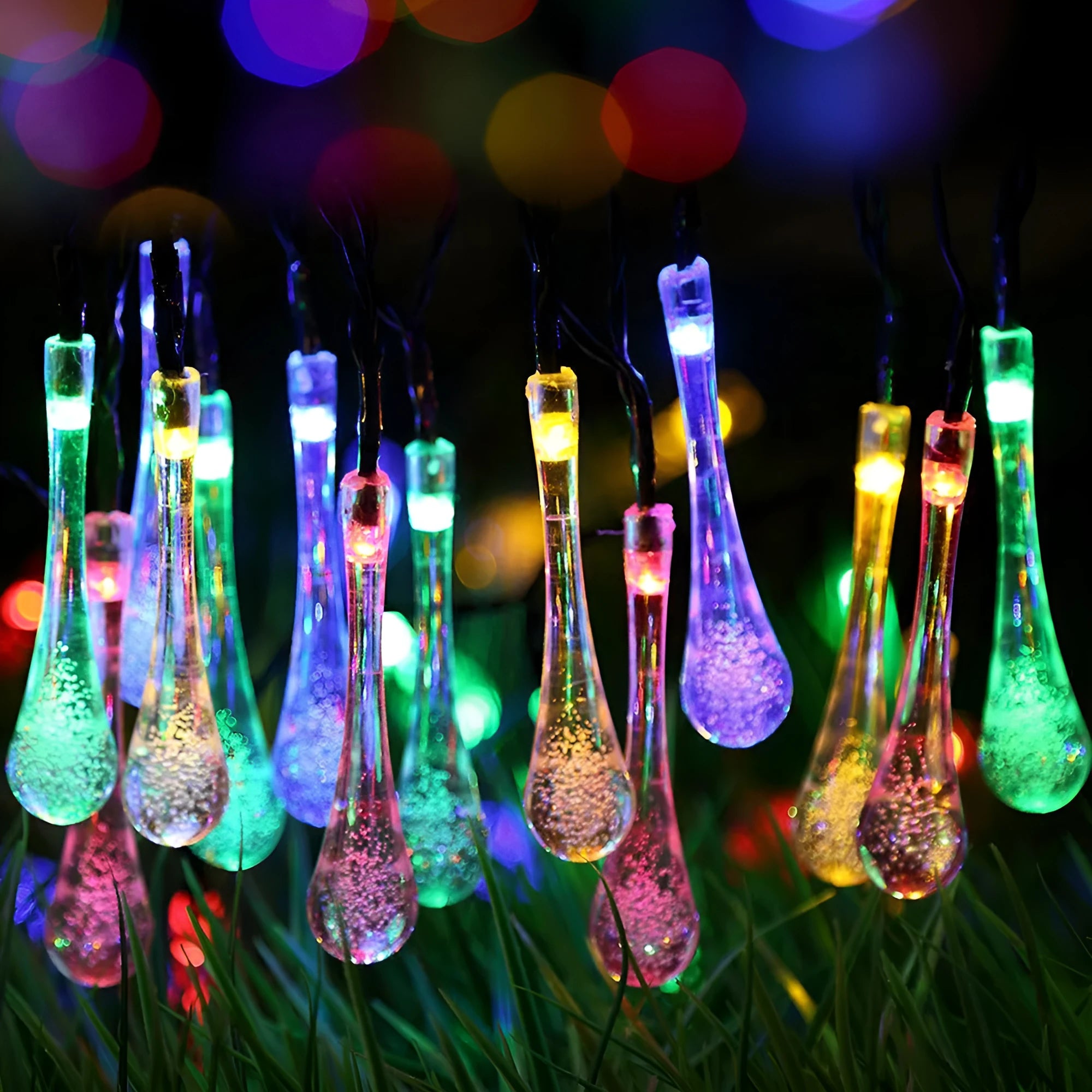 Solar LED outdoor string lights with water drop shaped pendants on a 6.5 metre cable for garden decoration