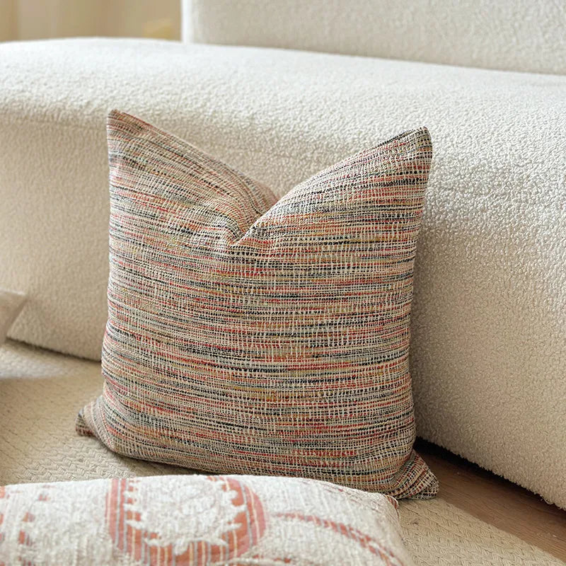American-style jacquard cushion cover with a paisley and floral pattern in an amber colour.