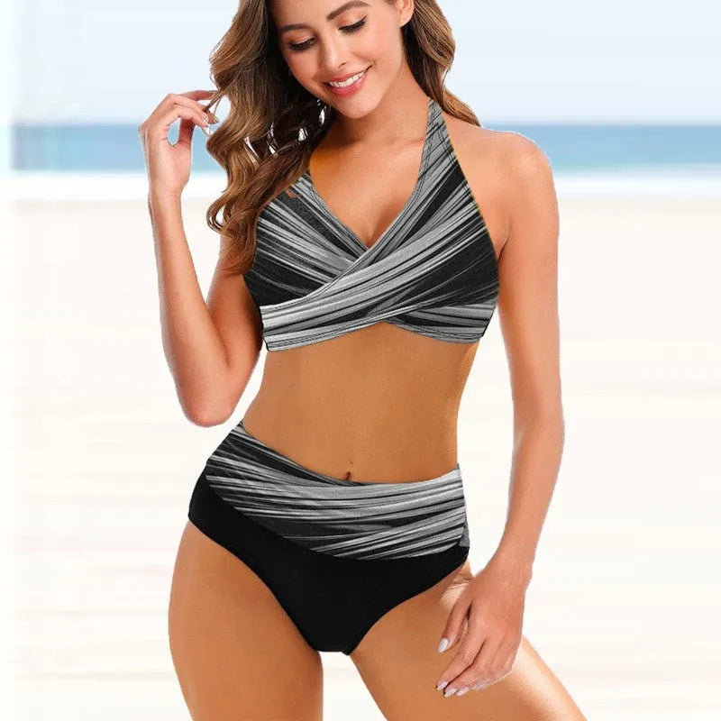 Women's striped tie-dye hollow-out bikini set showing high-waisted brief and backless design.