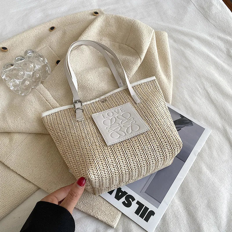 Women's woven straw shoulder bag in European retro style with three-dimensional pockets