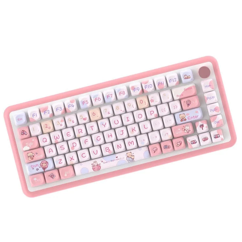Sweet cotton candy coloured PBT pudding keycaps for mechanical keyboards on a desk