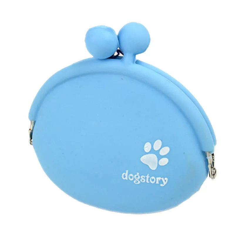Silicone dog treat pouch with hook and loop closure in yellow, green, orange, blue, and pink for pet training