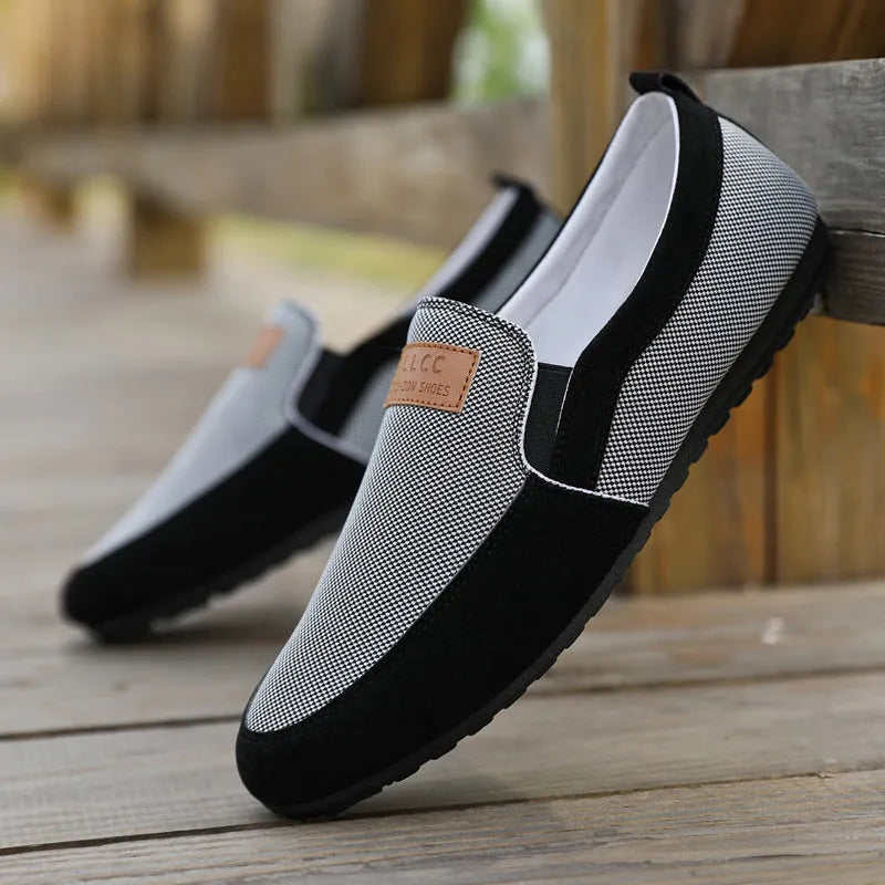 Men's grey canvas board shoes with round toe and rubber soles