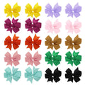 Set of 20 colourful 3-inch grosgrain ribbon pinwheel hair bows with alligator clips for toddlers.