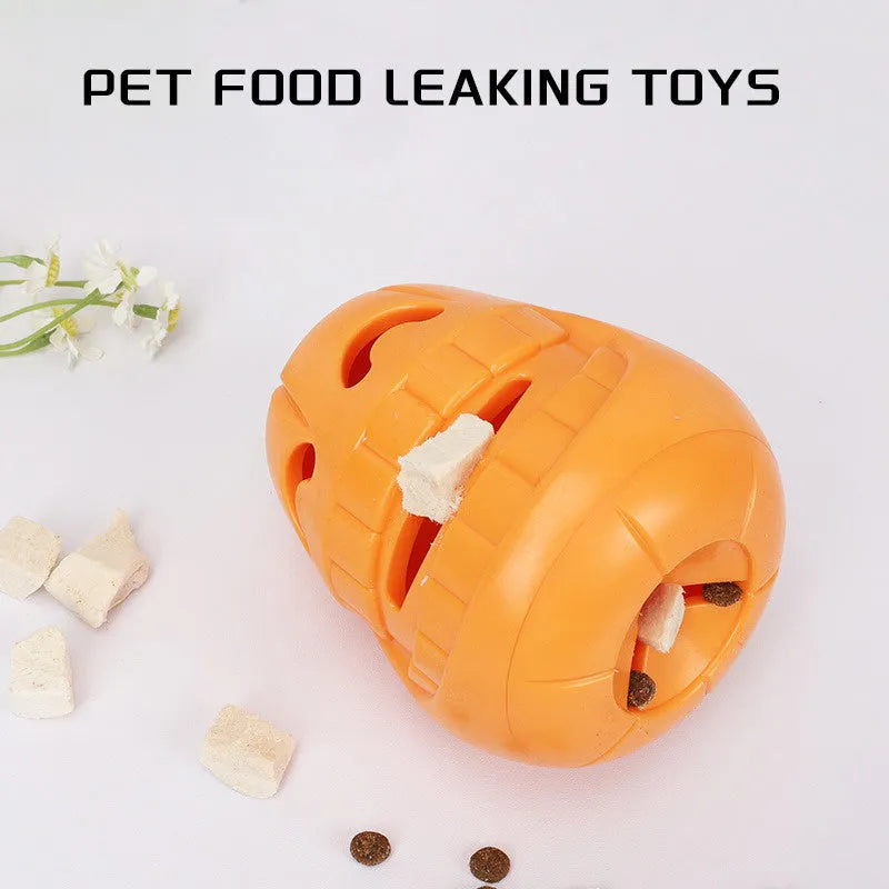 Orange Halloween pumpkin shaped interactive dog chew toy made of thermoplastic rubber with treat dispensing funnel design for all breed sizes