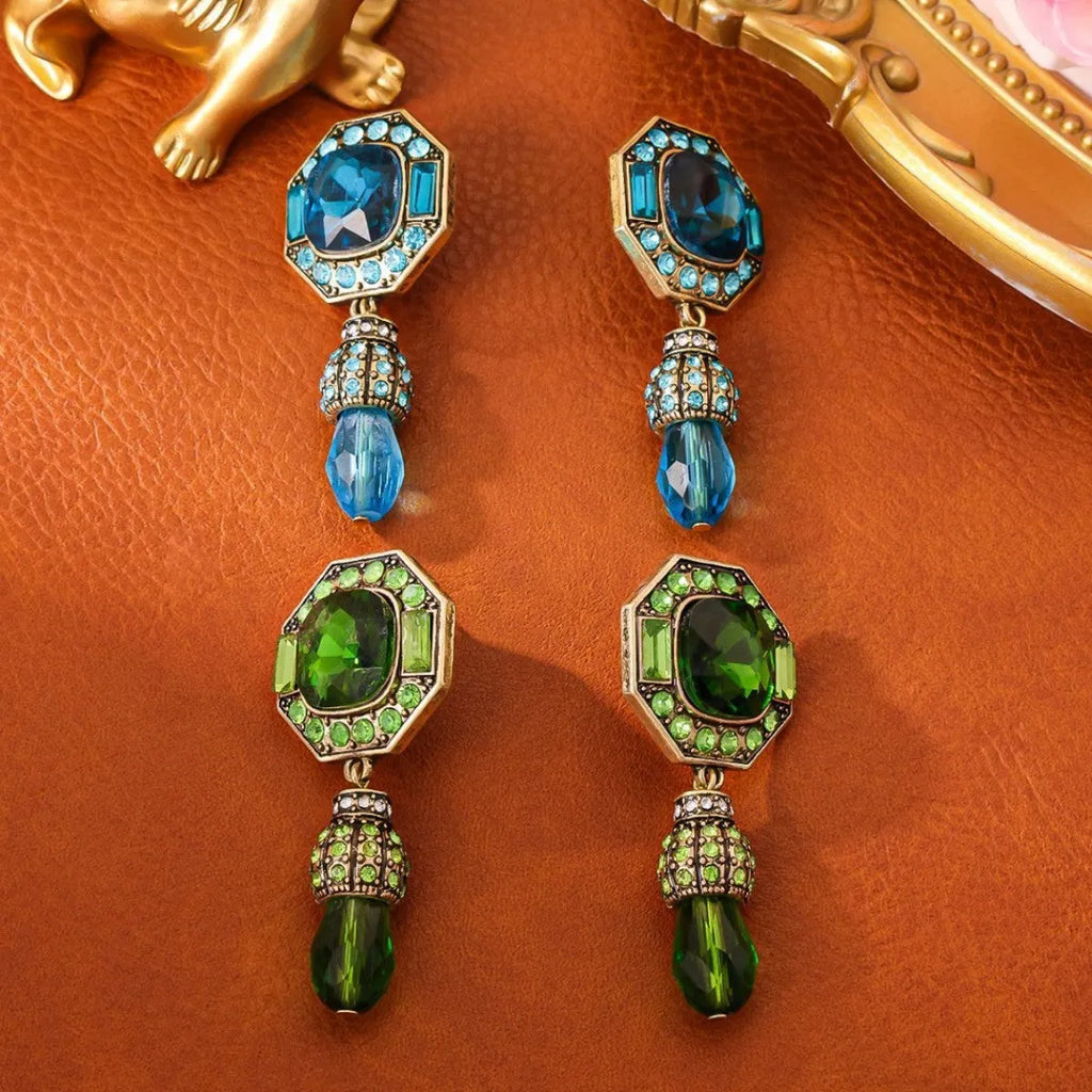 Full-jeweled geometric octagonal stud earrings in blue or green copper alloy for female wearers