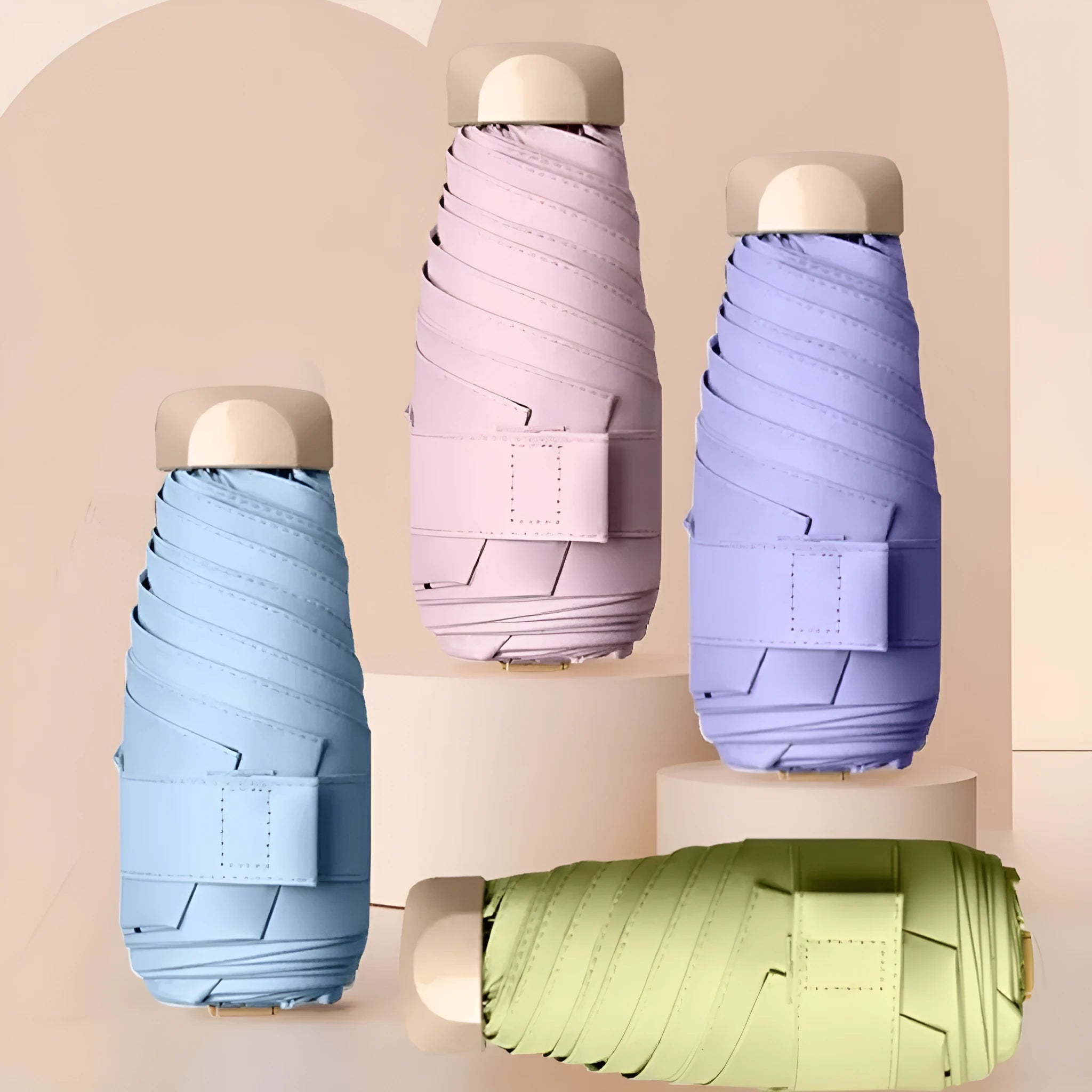 Closed five-fold manual umbrella with a gradient vinyl sunshade, showing the six-alloy-bone frame and one of eight colour options.