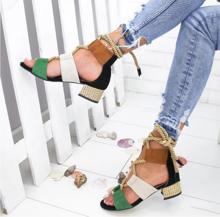 Women's suede front strap sandals with mid-heel, fish mouth toe, available in multiple colours.