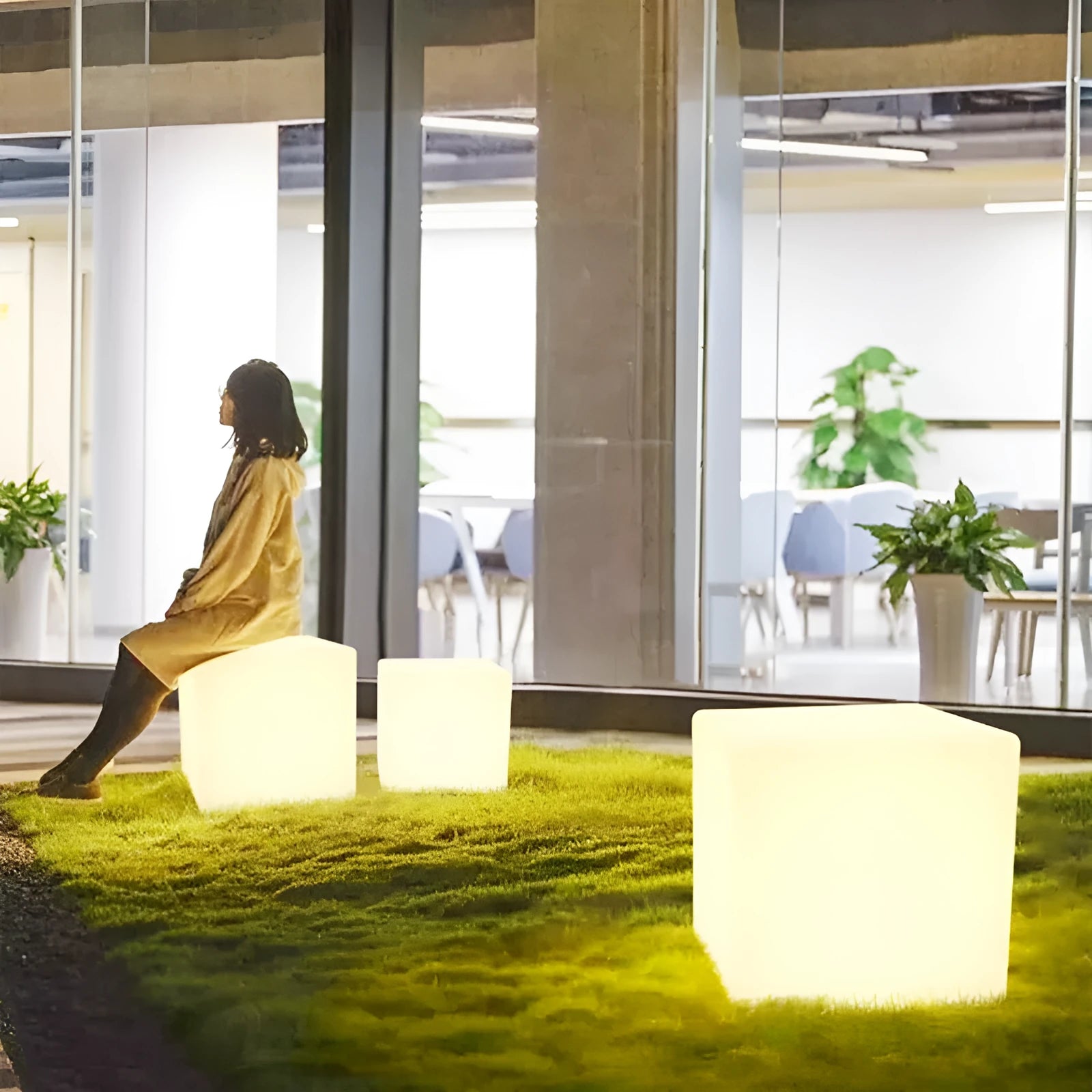 Square LED cube light for outdoor garden or patio use with modern design