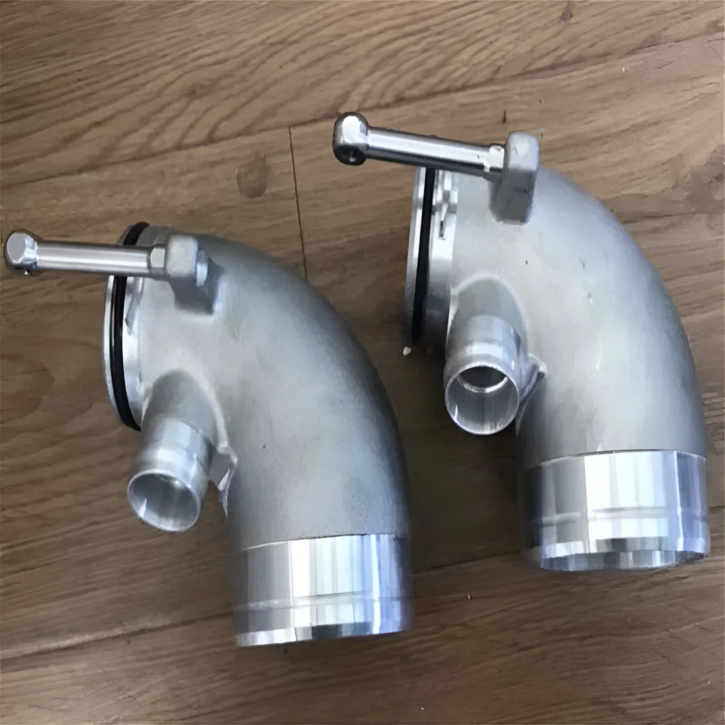 Aluminium alloy 90-degree automobile turbine elbow for lateral engine turbo positioning