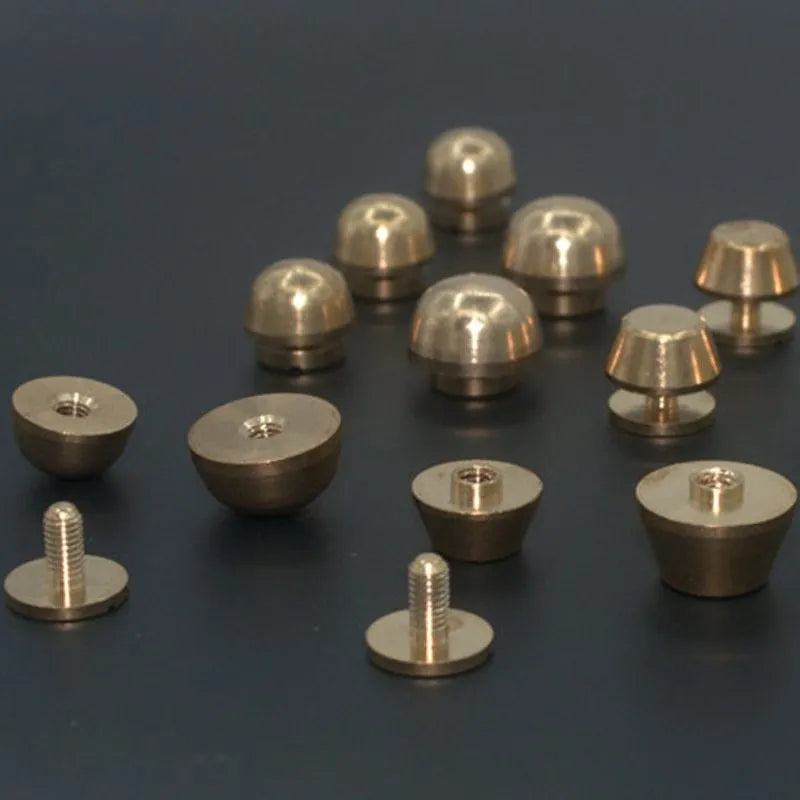 Brass decorative buckles in 10x6mm and 12x7mm sizes with round and geometric foot nail designs