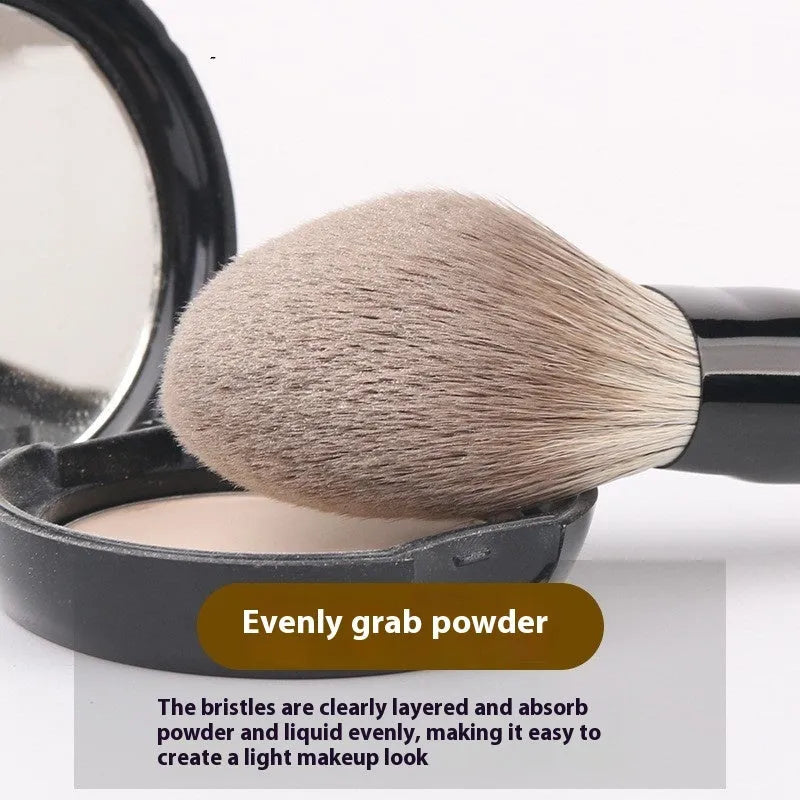 A 12-piece makeup brush set with soft bristles and wooden handles in a PU brush bag