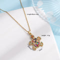 Gold-plated copper sea turtle necklace with zirconium-encrusted inlay on a titanium steel O-link chain