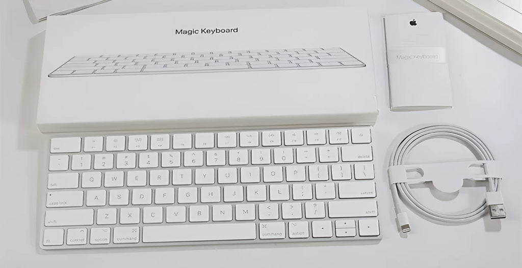 White Apple Bluetooth wireless keyboard with ultra-thin metal construction and multimedia function keys